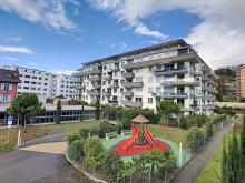 Appartement de 4,5 pièces avec terrasse et jardin, proche de commodités